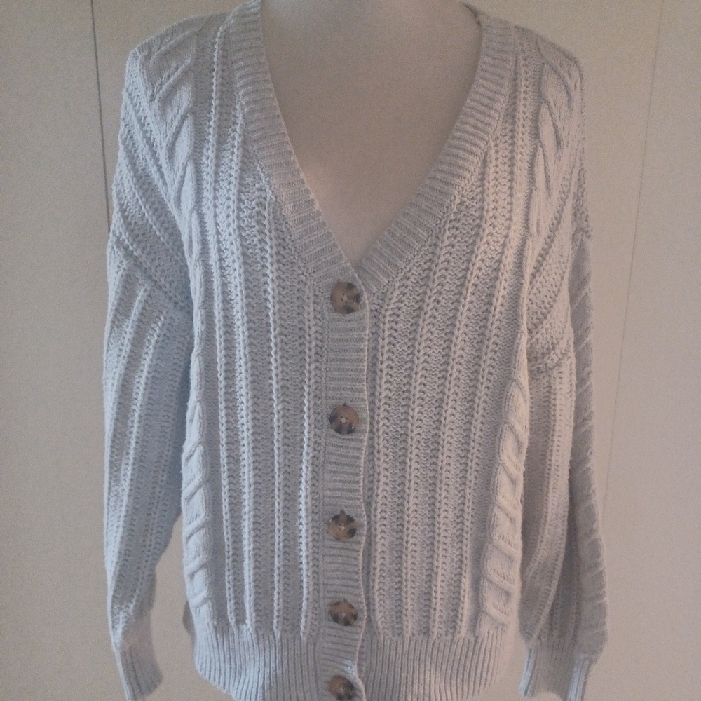 Light powder blue knitted with brown buttons